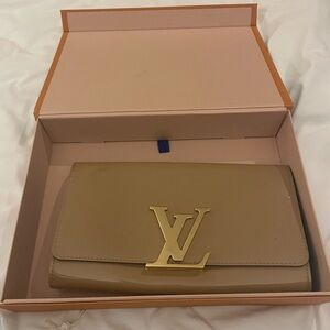 LV patent leather nude clutch!  So cute and trendy. Like new.
